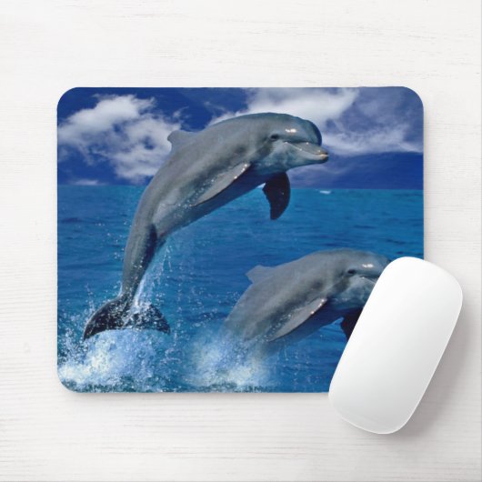 Die Delphine springend für Freude auf einer Mousepad (Mit Mouse)