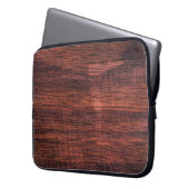 Die dunkle Holzstruktur hat früher Hintergründe. N Laptopschutzhülle (Vorderseite Links)