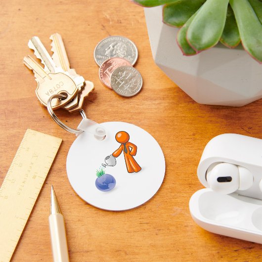 Die Erde bewässern Schlüsselanhänger