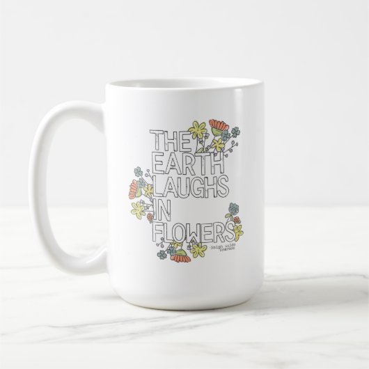 Die Erde lacht in Blume Kaffeetasse (Links)