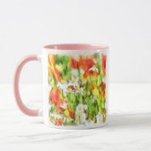 Die Frühlingsfarben auf sonniger Wasserfarbe Tasse (Links)