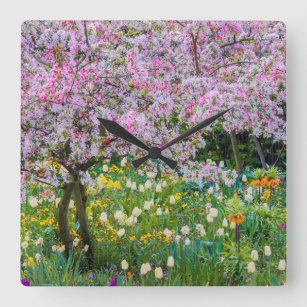 Die Frühlingszeit im Garten von Claude Monet Quadratische Wanduhr