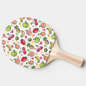 die gezeichnete Hand trägt Muster Früchte Tischtennis Schläger (Seitenansicht)