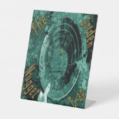 Die goldene Nugget-Falle Sockelschild (Vorderseite)