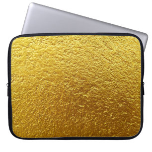Die goldene Wandtextur ist abstrakt, alt, antike Laptopschutzhülle