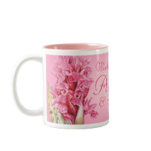 Die größte Tasse der Welt mit rosa Orchideen