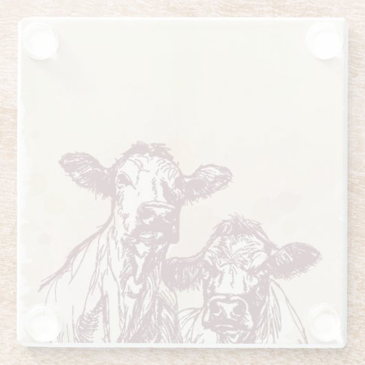 Die Hand mit zwei Kühen zeichnen die Skizze u. Glasuntersetzer (Rückseite)