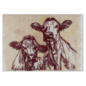 Die Hand mit zwei Kühen zeichnen die Skizze u. Schneidebrett (Vorderseite)