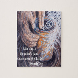 Die Hände des Töpfers mit Schrift Puzzle