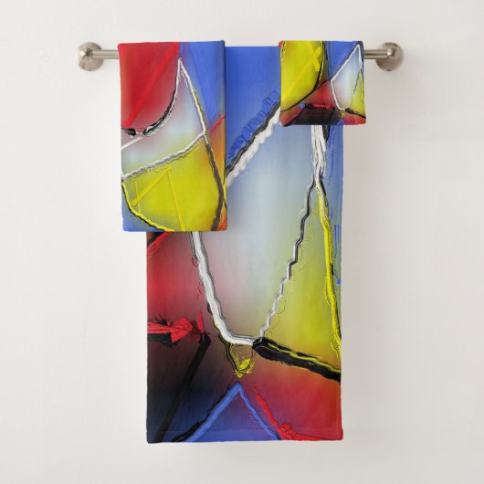 Die Handtücher sind rot, gelb, schwarz und blau. (Insitu)