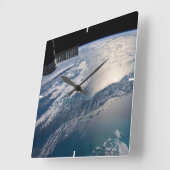 Die Internationale Raumstation über dem Atlantik Quadratische Wanduhr (Winkel)