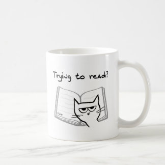 Die Katze fordert Buch-Liebhaber - lustige Kaffeetasse