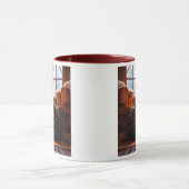 Die Katze schläft in einer Holzhütte neben dem Feu Tasse (Zentrum)