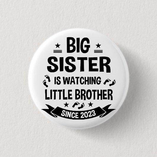 Die kleine Schwester kümmert sich um den großen Br Button (Vorderseite)