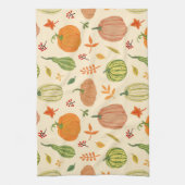 Die Kürbis sind grün und orange, das Muster ist na Geschirrtuch (Vertikal)