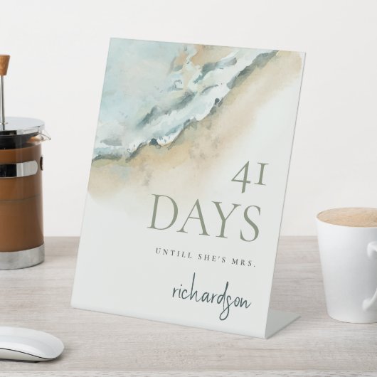 Die Küste weht Sandstrände Tage bis Frau. Sockelschild (In SItu)