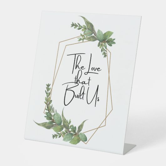 Die Liebe, die uns aufgebaut hat Sockelschild (Vorderseite)