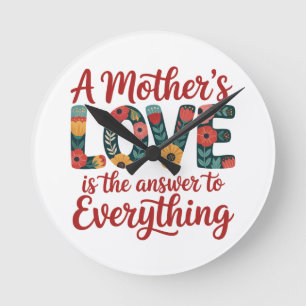 Die Liebe einer Mutter ist die Antwort auf alles Runde Wanduhr