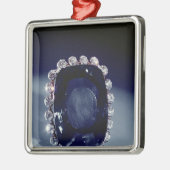 Die Logan-Brosche Silbernes Ornament (Links)