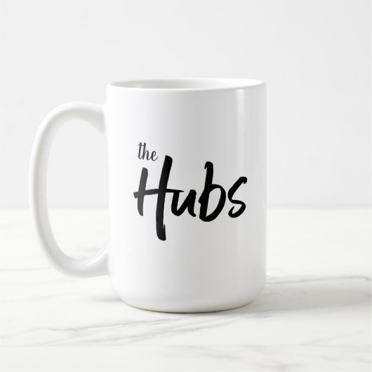 Die moderne Hubs-Skripttypografie Kaffeetasse (Links)