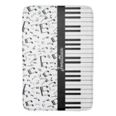 Die Musiknoten und die Piano-Tasten sind in Schwar Badematte (Vorderseite Vertikal)