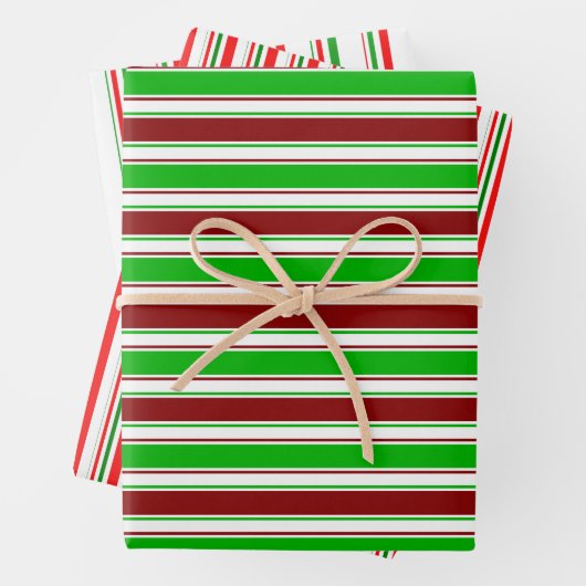 Die Muster sind grün, weiß, rot und weich. Geschenkpapier Set (Beispiel)