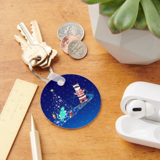 Die Nacht des Weihnachtsmanns in der Erwärmung Schlüsselanhänger (Schreibtisch)