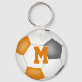 Die orangefarbene Fußballmannschaft färbt Kindersp Schlüsselanhänger (Rückseite)