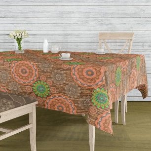 Die Orangen, mit Blumen bestreuten Fäden strukturi Tischdecke