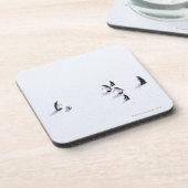 Die Pinguine, die Fußball spielen Untersetzer (Linke Seite)