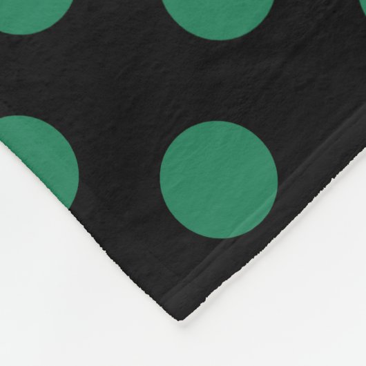 Die Pollenköpfe sind grün und schwarz Fleecedecke (Ecke)