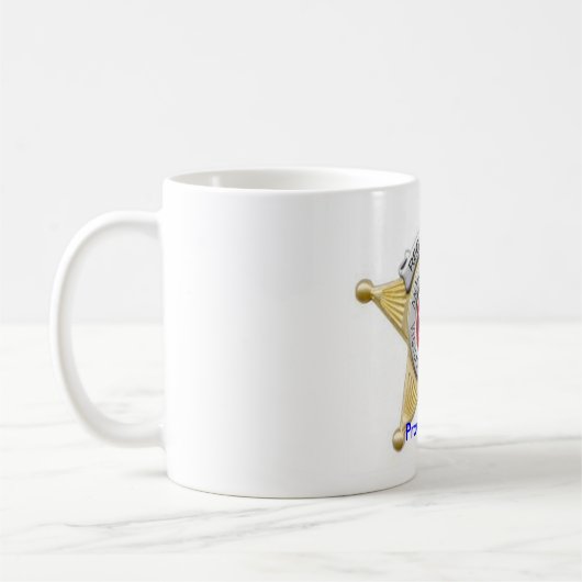 Die Regler-Abzeichen-Tasse Kaffeetasse (Links)
