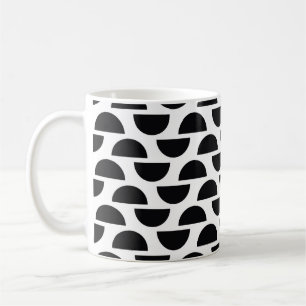 Die schwarzen Hälften des Kreises erzeugen ein ein Kaffeetasse