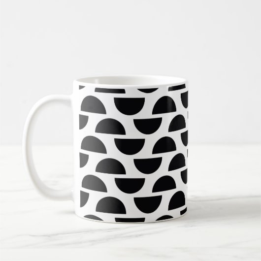 Die schwarzen Hälften des Kreises schaffen einen e Kaffeetasse (Links)