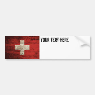 Die Schweiz-Flagge auf altem hölzernem Korn Autoaufkleber