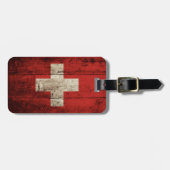 Die Schweiz-Flagge auf altem hölzernem Korn Gepäckanhänger (Vorderseite horizontal)