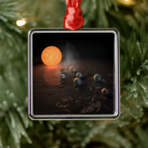 Die sieben Planeten von Trappist-1 sind im Orbit u Ornament Aus Metall