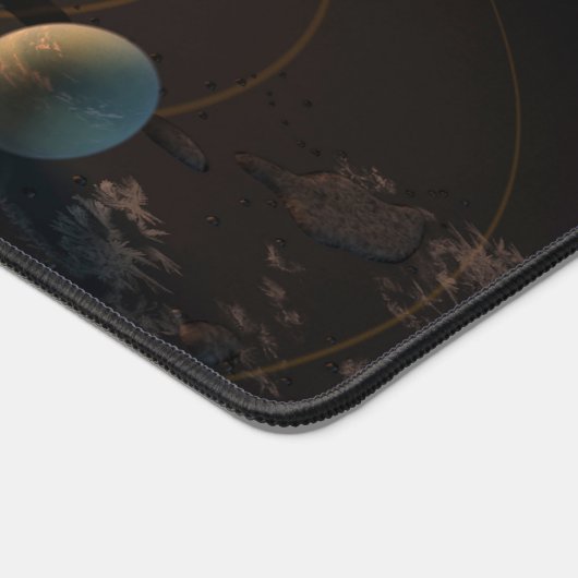 Die sieben Planeten von Trappist-1 sind im Orbit u Schreibtischunterlage (Ecke)