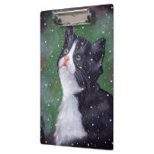 Die Smokings-Katze, die oben Schnee betrachtet, Klemmbrett (Links)