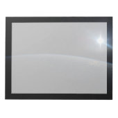 Die Sonne liegt über dem Horizont der Erde. Notizblock (Vorderseite)