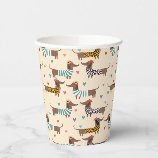 Die sonnigen Dackeln in Hats und Sweatern Pappbecher (Links)