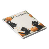 Die spielerische schwarze Katze mit Pumpkin-Inspir Notizblock (angewinkelt)