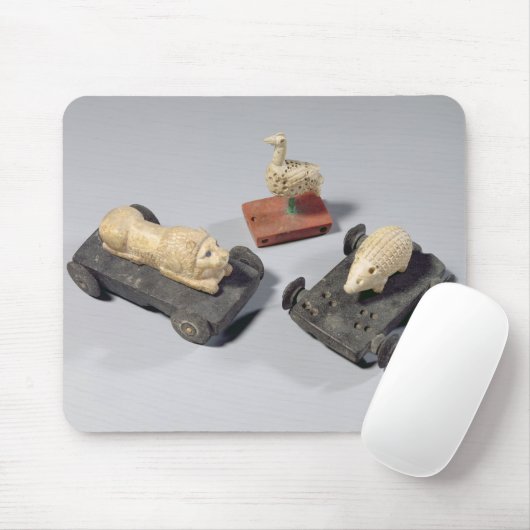 Die Spielwaren der Kinder: ein Igel, ein Löwe und Mousepad (Mit Mouse)
