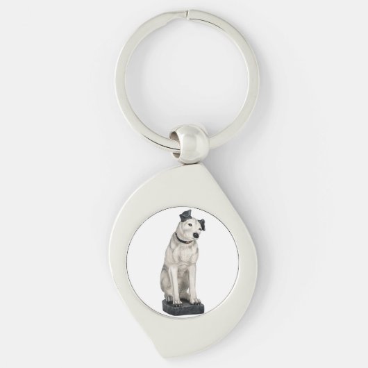 Die Sprachsignatur seines Meisters verriegelt den  Schlüsselanhänger (Vorderseite)