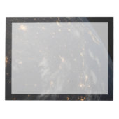 Die Stadt beleuchtet nachts auf der Erde Notizblock (Vorderseite)