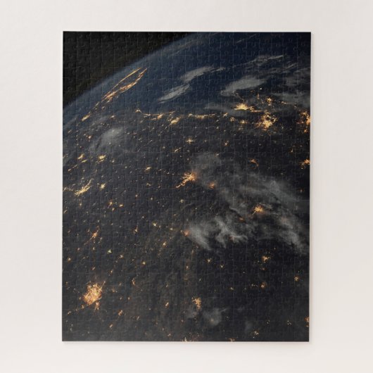 Die Stadt beleuchtet nachts auf der Erde Puzzle (Vertikal)