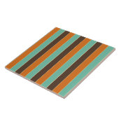 Die Streifen sind grün, schwarz und orange Fliese (Seite)