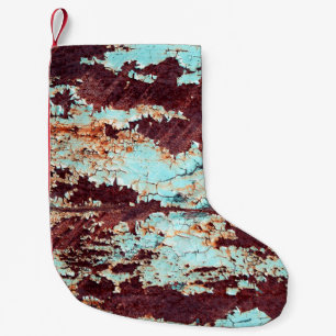 Die Struktur eines rostigen Eisens und eines blaue Kleiner Weihnachtsstrumpf