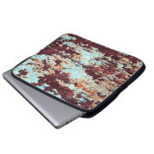 Die Struktur eines rostigen Eisens und eines blaue Laptopschutzhülle (Vorne Knopf)