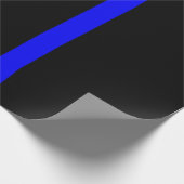 Die symbolische dünne blaue Linie auf schwarz Geschenkpapier (Ecke)